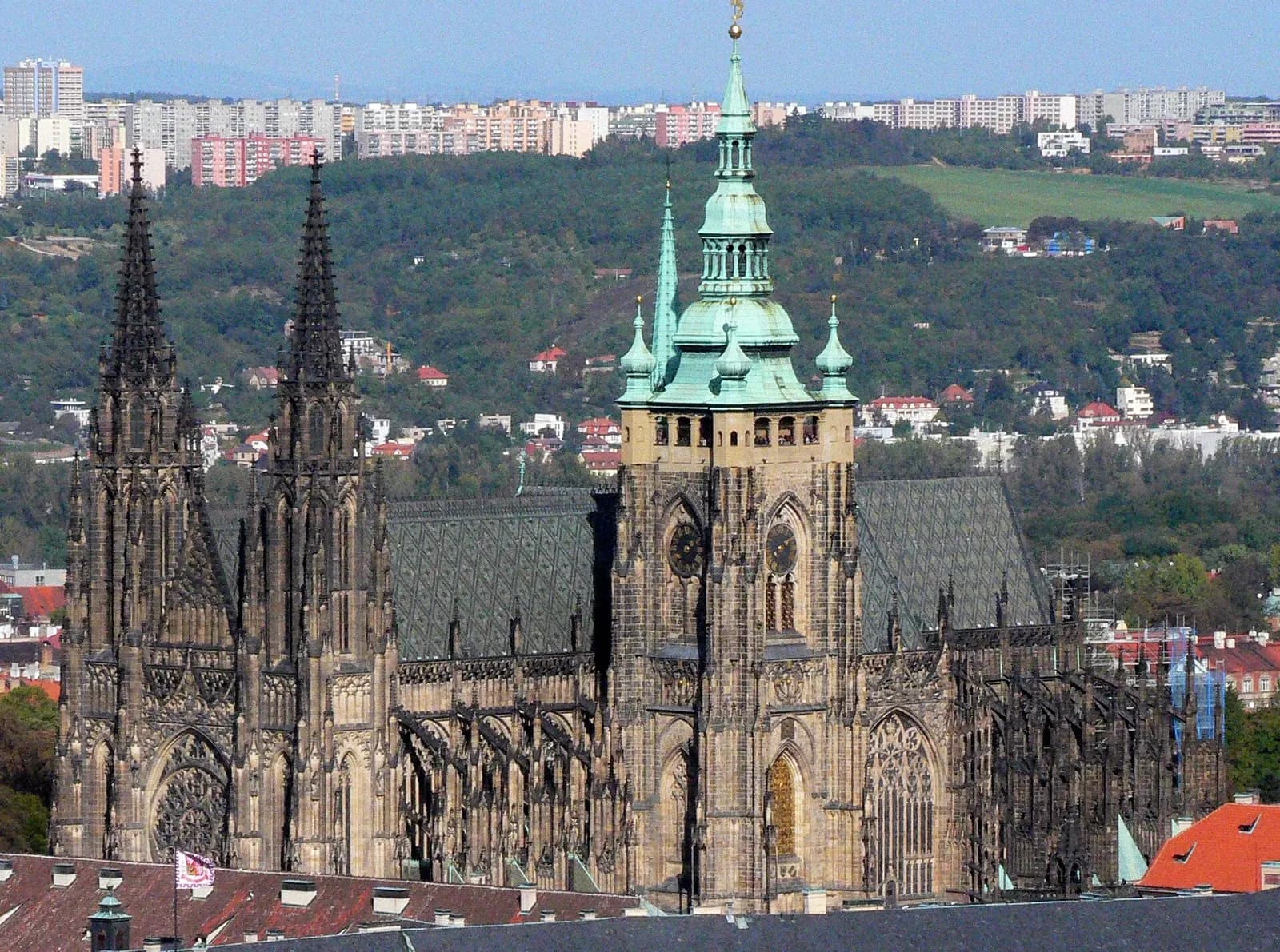 St Vitus Cathedral at Prague Castle, its Gothic spires and green copper tower above the city